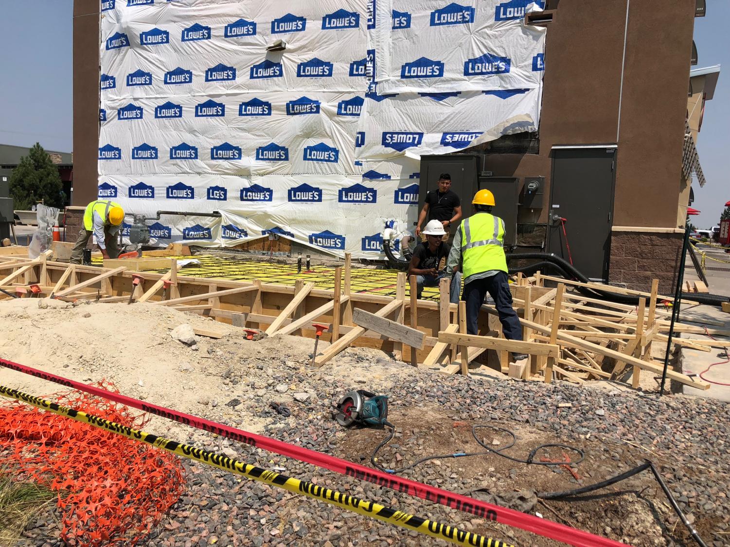 Construction workers begin the remodeling of the Chick-fil-A kitchen a couple weeks before the official temporary closing.