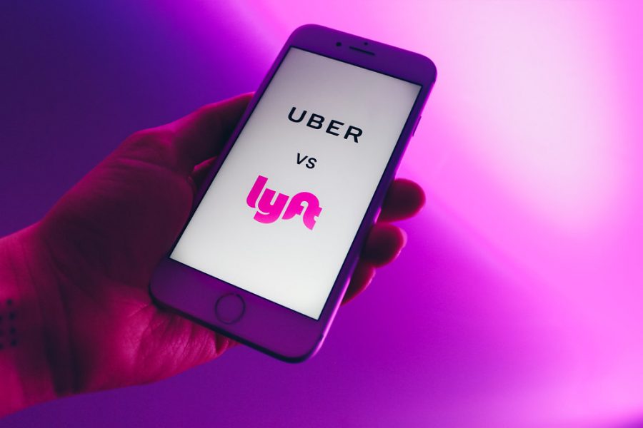 ++Uber+and+Lyft+are+taxicab+services+that+are+scheduled+through+a+mobile+app+to+secure+and+find+rides+for+people.+%28Attribution+2.0+Generic+%28CC+BY+2.0%29%29
