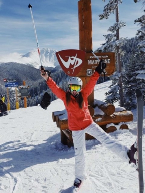 Senior Delaynie Treat jumps for joy at the top of the ski slope. I go up about five times a season, but I wish I could go more, said Treat. 