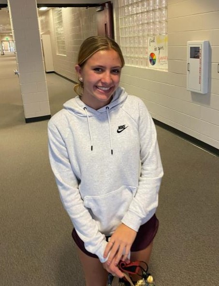 Payton Lourenco (9) smiles after an exhausting day of finding new classes, and making new friends. A freshman at Cherokee Trail, Lourenco (9) said,” I’m feeling the pressure of it all.” Lourenco hopes that things will return to normal soon. Photo by Olivia Semple.