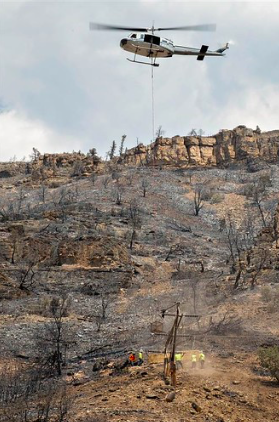 Clean-up at the Grizzly Creek fires is underway on Sept. 9, requiring government-ordered assistance. Gov. Jared Polis officially declared a state of emergency to clean damage around I-70 due to the Grizzly Creek fires. 