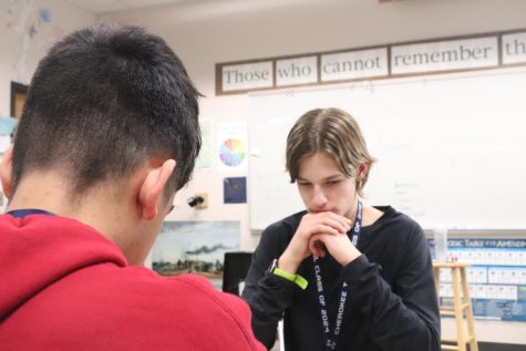 Two players focus in as they play an intense game of chess. Chess club meets every other Monday in room 240 after school.